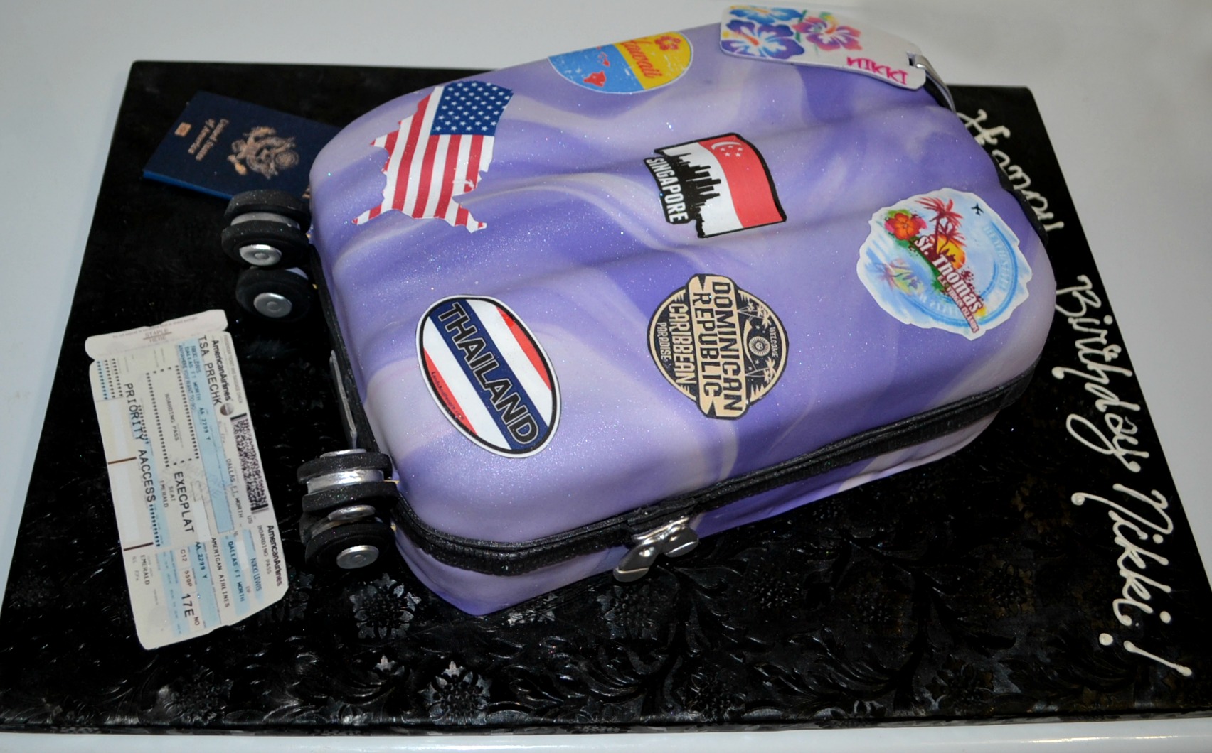 purple luggage with wheels